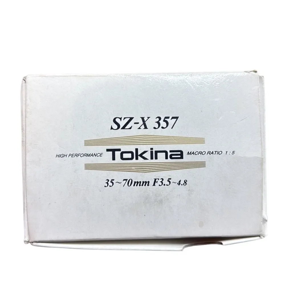 Tokina SZ-X 357 camera lens 49mm NIB